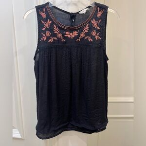 EM black blouse with floral embroidery and button down open back, size large